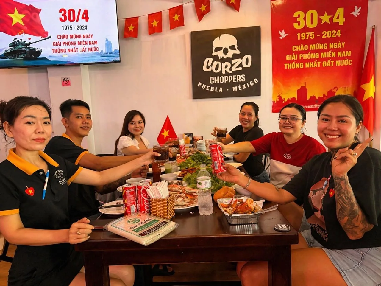 Friends enjoying a meal at Ironworks
